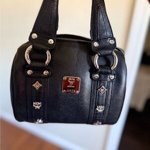 NOT FOR SALE 
MCM Black Mini Bag with Silver Accents